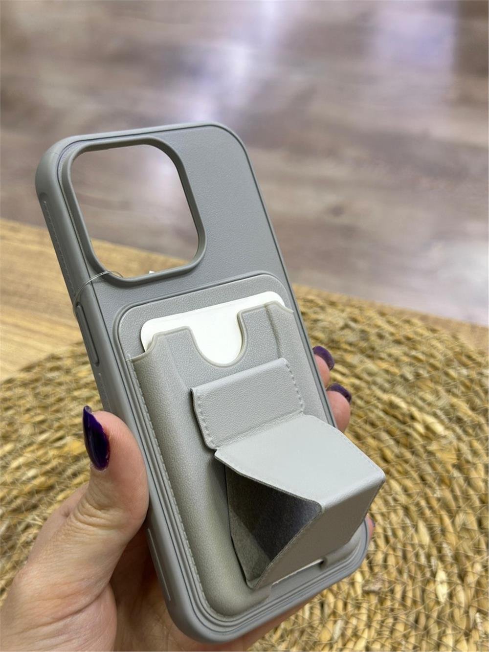 All in One Premium Leather Back Cover for Apple iPhone  with Card Slot & Foldable Grip Holde